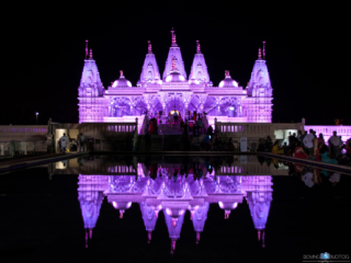 A nighttime view of the BAPS Shri Swaminarayan Mandir [Hindu Mandir - Houston, TX]